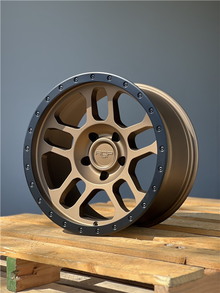 AGP 301-8 TRUX 17X9-12 5X127 CB-71.5 BRONZE W/BLACK RING